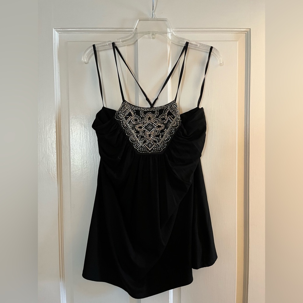 White House Black Market women’s tank top, in black. Beaded embellishment.